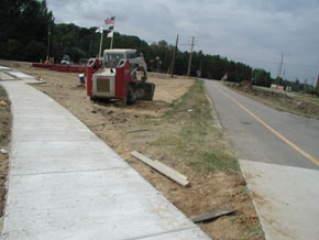 Site shot of intersection of sidewalk and bike path